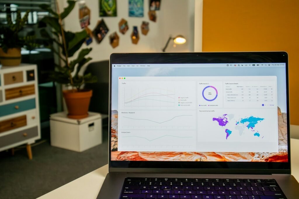 Digital marketing analytics displayed on an office laptop